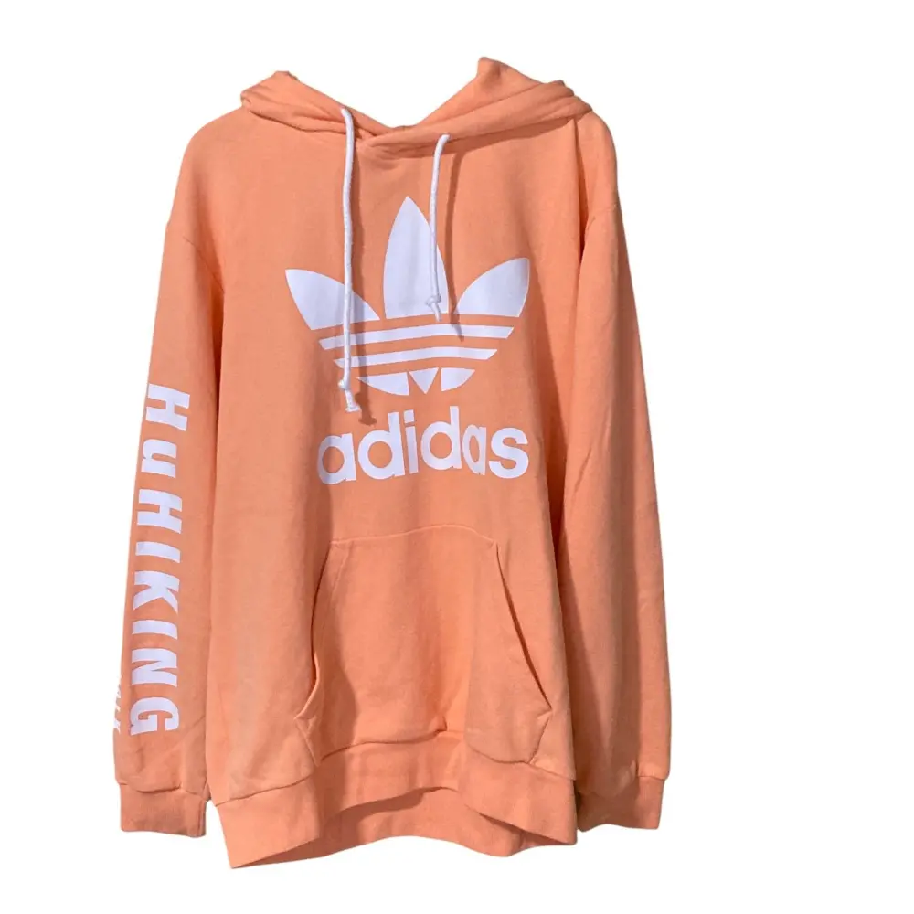 adidas Originals アディダスオリジナルス ファレルウィリアムス ロゴプルオーバーパーカー M オレンジ