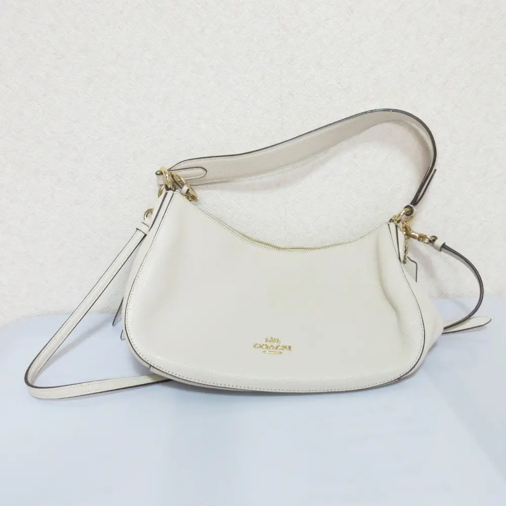 COACH コーチ サットン クロスボディ レザー タッセル ショルダーバッグ ハンドバッグ 52548 オフホワイト
