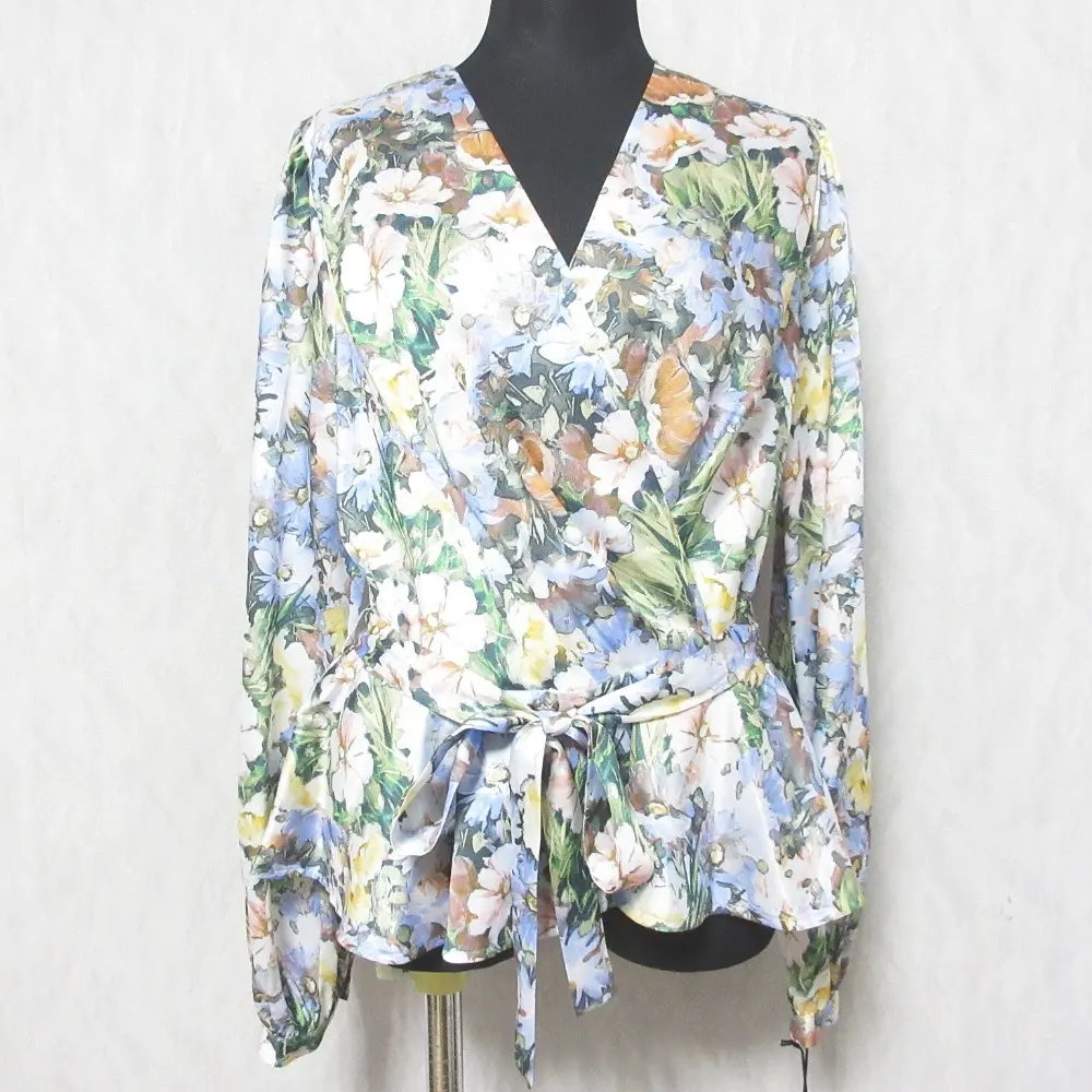 24SS GRACE CONTINENTAL グレースコンチネンタル グラデフラワープリントトップ ペプラムブラウス 0124141030 38 サックス