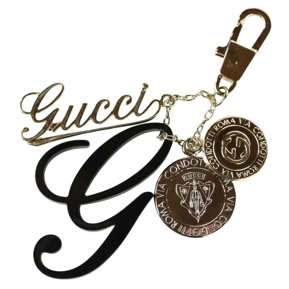 GUCCI グッチ コイン ロゴチャーム キーホルダー ゴールドカラー