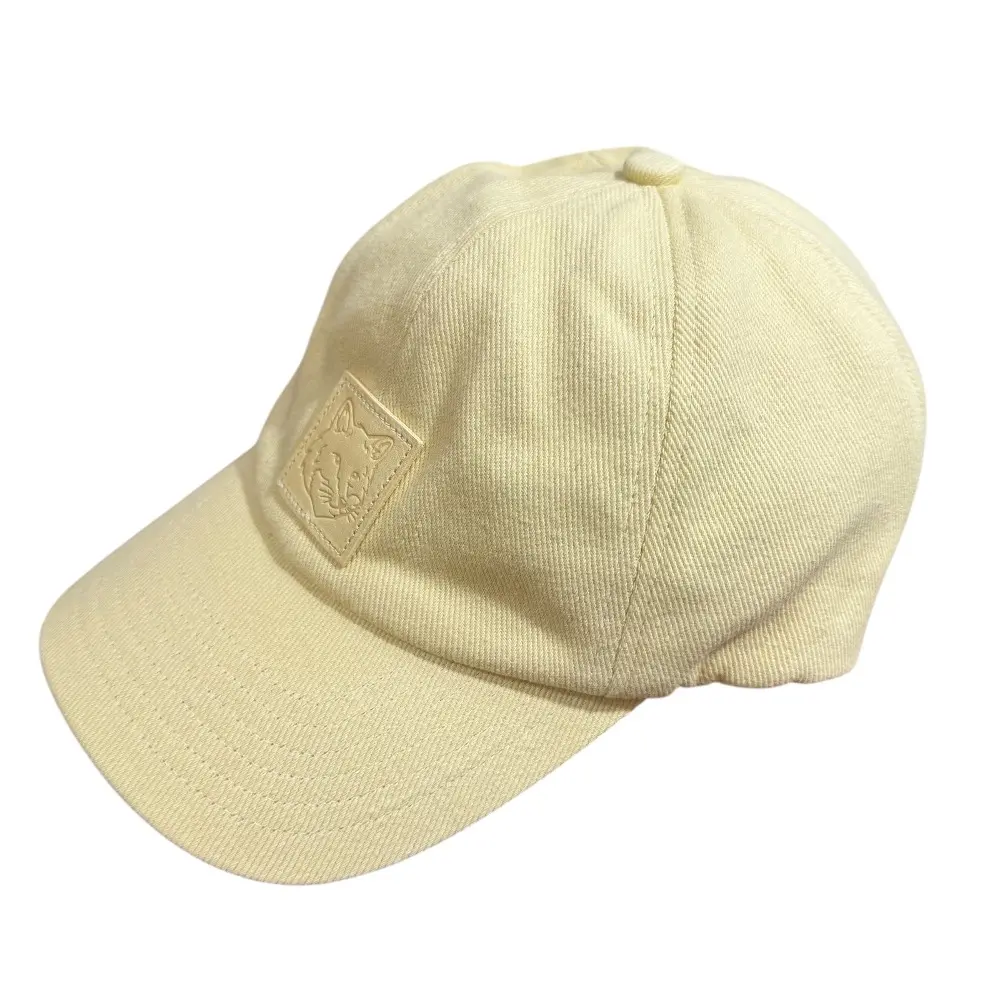 Maison Kitsune メゾンキツネ ボールド フォックスヘッド レザー パッチ 6P キャップ 帽子 イエロー
