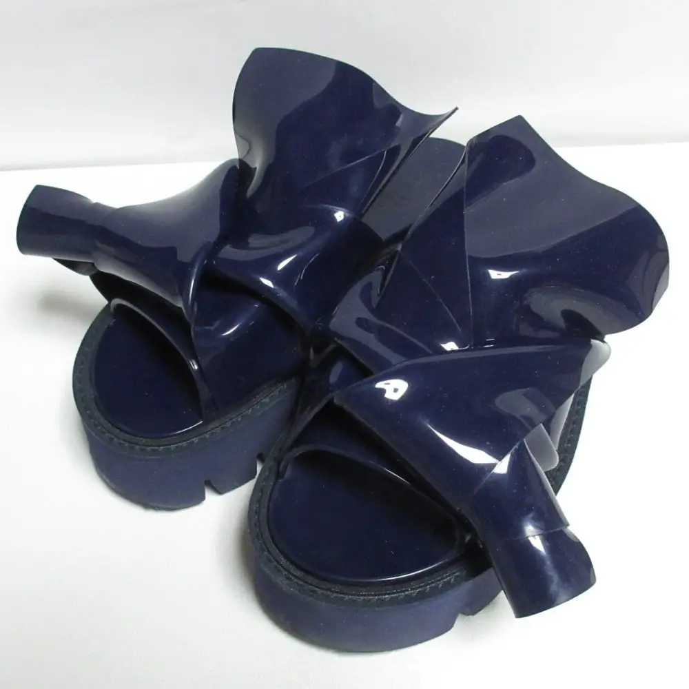 N°21 ヌメロヴェントゥーノ ×Kartell カルテル コラボ KNOT PVC プラットフォーム 厚底 リボンサンダル 38 25.0cm相当 ブルーの買取実績【2024年10月買取】